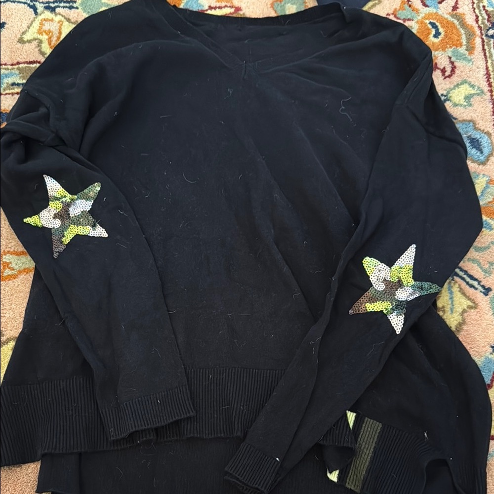 Black Sweater with Star Accents